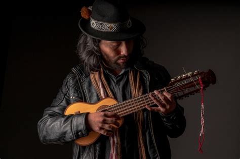 Premium Photo | Peruvian musician with andean instrument