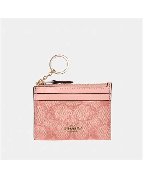 Coach Mini Skinny Id Case In Signature Canvas In Pink Lyst