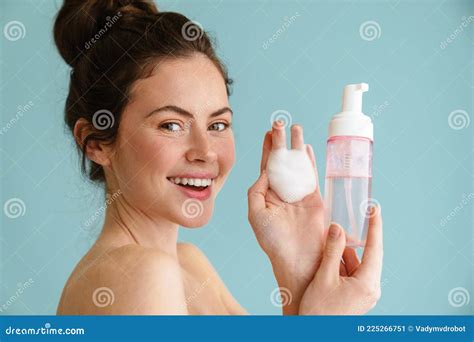 Half Naked Brunette Woman Smiling While Showing Cleaning Foam Stock