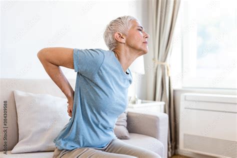 Matur Woman Suffering From Lower Back Pain Mature Woman Resting With