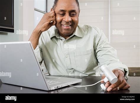 Mature Man Using Webcam Stock Photo Alamy