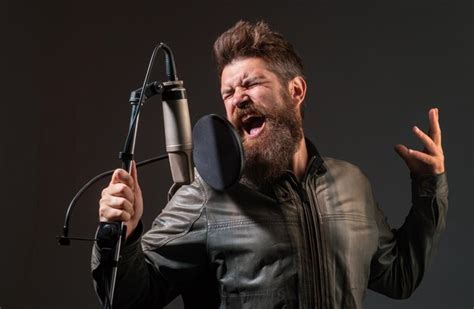 Premium Photo Singing Man In A Recording Studio Expressive Bearded