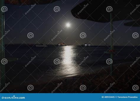 Moonlight path stock image. Image of boats, lunar, moonlight - 48933445