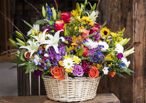 Colorful Funeral Basket By Gallea S Greenhouse Florist