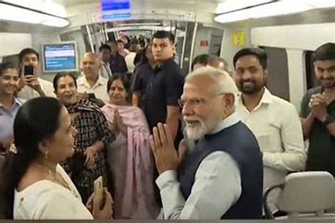 Watch Pm Modi Takes A Ride In Metro Co Passenger Wishes Him Happy Birthday With A Sanskrit