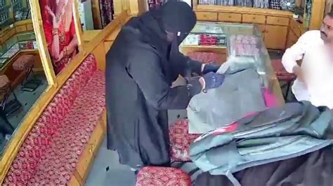 Hyderabad Robbery Of A Jewellery Shop By Man Dressed In Burqa And