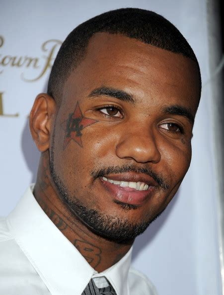 rapper  game portrays jesus  gang member  album cover path