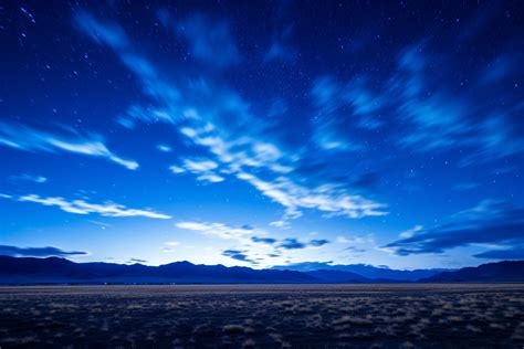 Dramatic Night Sky with Luminescent Clouds and Starry Backdrop - Free ...