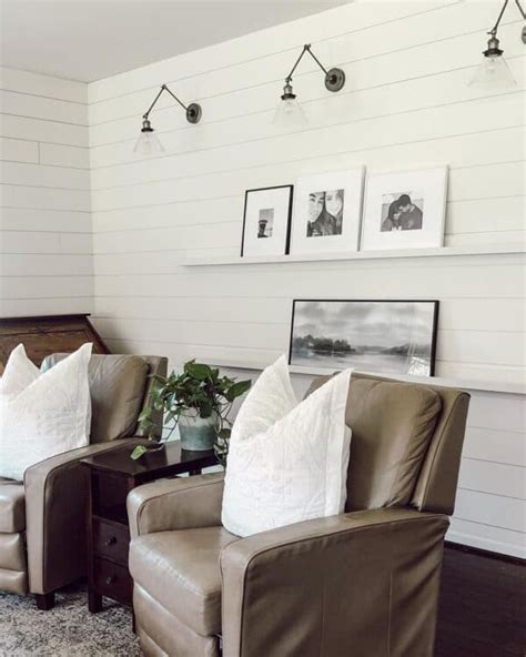 Shiplap Living Room With Swing Arm Sconces Soul Lane