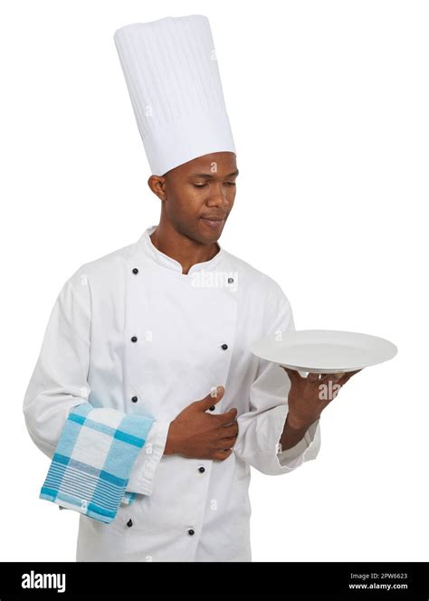 The food of your choice. An african chef holding a plate - Copyspace ...