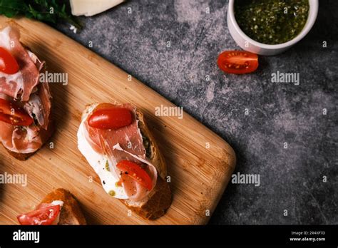 Bruschetta With Prosciutto Pesto Mozzarella And Tomatoes Food