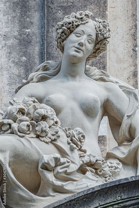 Old Statue Of A Sensual Baroque Era Naked Woman In Downtown Of Dresden