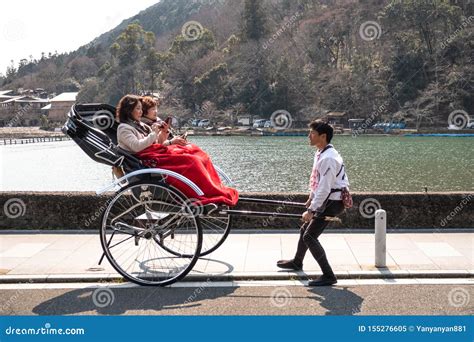 Chinese Rickshaw On Display In Front Of The Building Editorial Photo | CartoonDealer.com #121964963