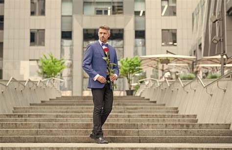 Premium Photo | Elegant man in tux man wearing tux bowtie outdoor ...