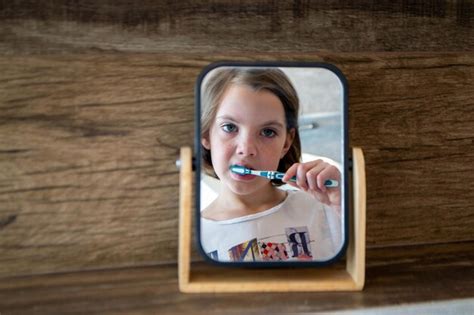 Premium Photo Oral Hygiene Healthy Teeth And Care Girl Brushing Teeth