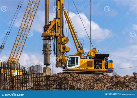 Yellow Hydraulic Drilling Rig On A High Rise Building Construction Site