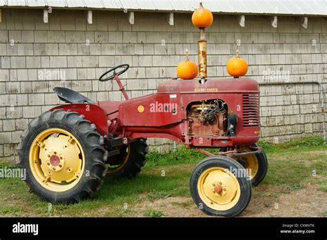 Old Massey Harris Tractor Decorated With Pumpkins At A Farm In Delta Ladner British Columbia