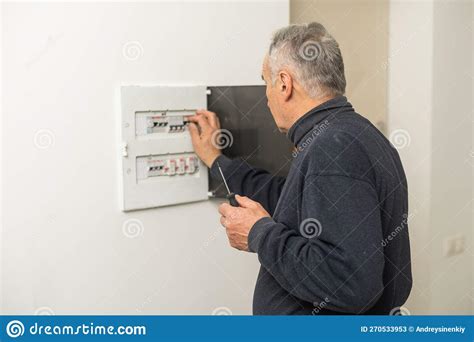 Elder Man Fixing An Electric Meter Stock Image Image Of Adult