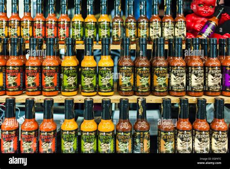 A Display Of Bottles Of Psycho Juice A Hot Sauce Stock Photo Alamy