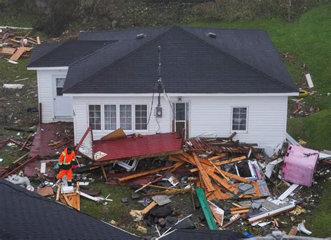 Trudeau tours storm-hit Atlantic Canada as power outages persist ...