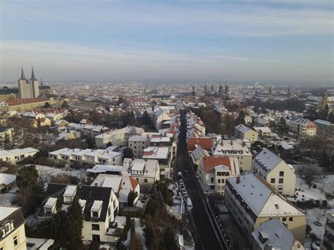 Aerial View of City Buildings Under Blue Sky · Free Stock Photo