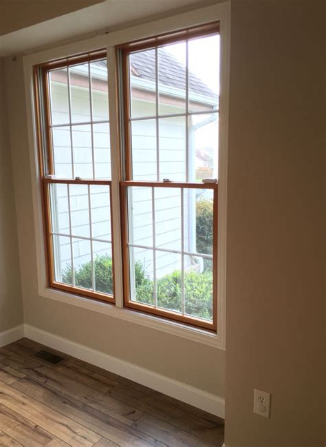 Wood Windows White Trim Shaw Laminate Floor In Lumberjack Hickory