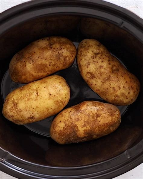 Crock Pot Baked Potatoes Perfectly Cooked Every Time Fit Foodie Finds Crockpot Recipes