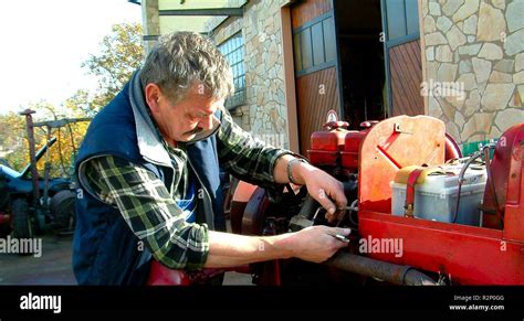 tractor repair 2 Stock Photo - Alamy