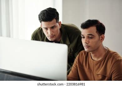 Team Leader Revising Code Written By Stock Photo 2203816981 | Shutterstock