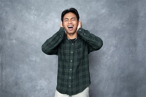 premium photo  man   hands   ears   words   happy