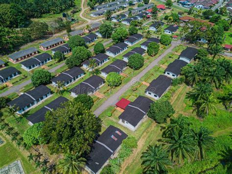 Aerial Drone View Of Rural Settlements Near Oil Palm Plantation In