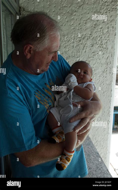 Father Holds His Baby Stock Photo Alamy