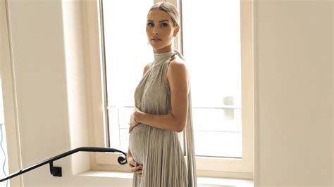 Agency News Holt Flaunts Baby Bump At Cannes 2023 Red Carpet LatestLY