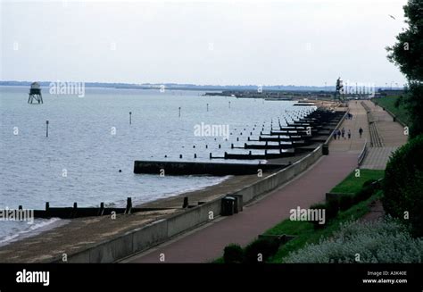 Beach groynes old lighthouses Dovercourt Harwich Essex England Stock ...