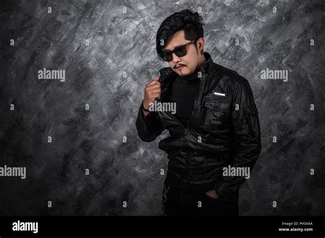 portrait of biker man in black leather jacket Stock Photo - Alamy