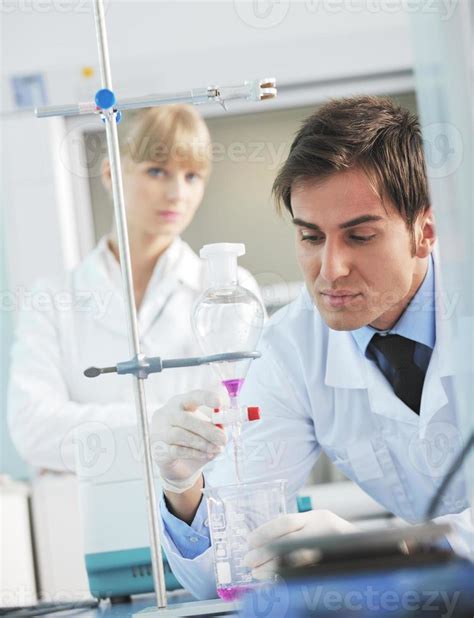 science people in bright lab 10389010 Stock Photo at Vecteezy