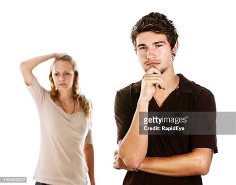 Couple Confused White Background Photos And Premium High Res Pictures