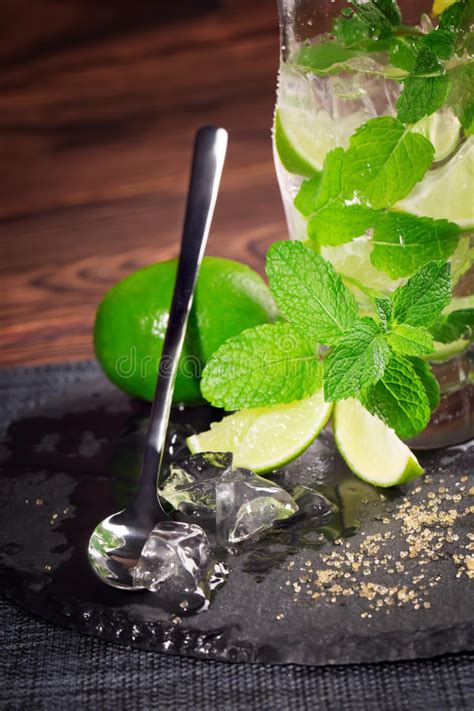 Refreshing Mojito With Fresh Lime Mint Brown Sugar Crushed Ice And