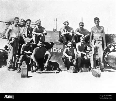 Lieutenant John F Kennedy Right And His Pt 109 Crew Are Shown