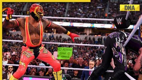 Wrestlemania 39: Rey Mysterio hits his son Dominik with a belt in front ...