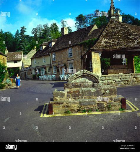 Castle Combe Village Market Cross And Old Cottages Castle Combe