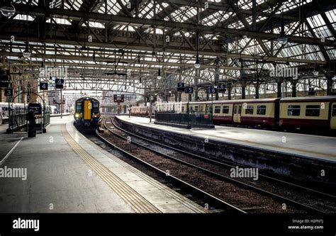 A Local ScotRail Commuter Passenger Train Arriving At Central Station