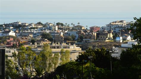 Cable car operating in Benalmadena with city and sea background ...