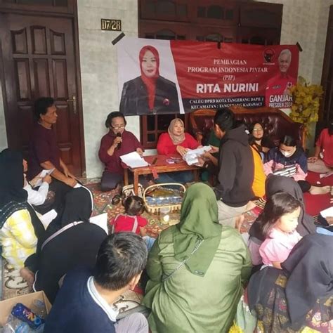 Rita Nurini Didampingi Junidar Nababan Bendahara REPDEM Kota Tangerang