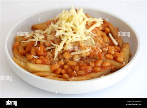 Baked Beans Cheese and Chips Stock Photo - Alamy