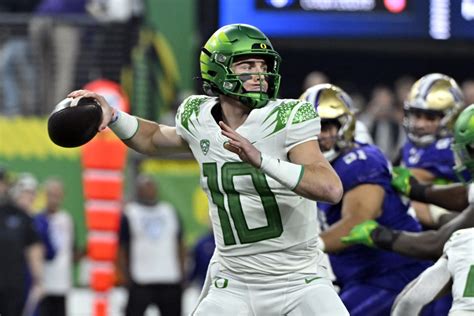 Oregon Quarterback Bo Nix Dejected After Loss In Pac 12 Championship