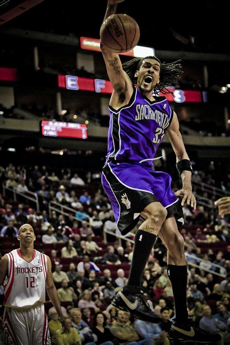 Brown Basketball on Grey Floor · Free Stock Photo