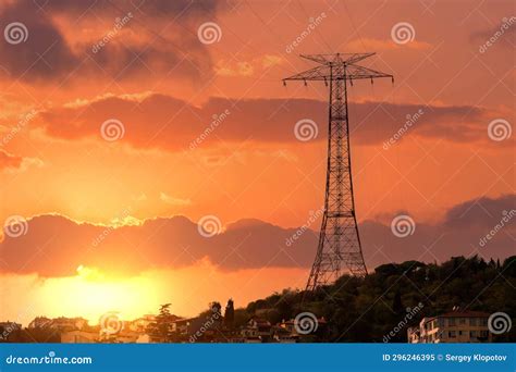 A Large Power Line Support On A Mountain Against A Background Of A