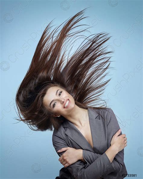 Girl with flying hair poses in a Studio on a - stock photo 2733581 ...