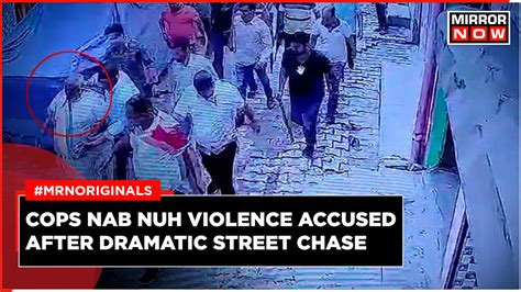 Nuh Violence Cops With Sticks Guns Chase Accuse Bittu Bajrangi Video